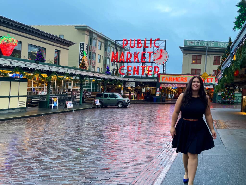 Girl walking away from Pike Place Market